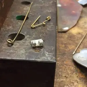 how to fix a loose brooch clasp?