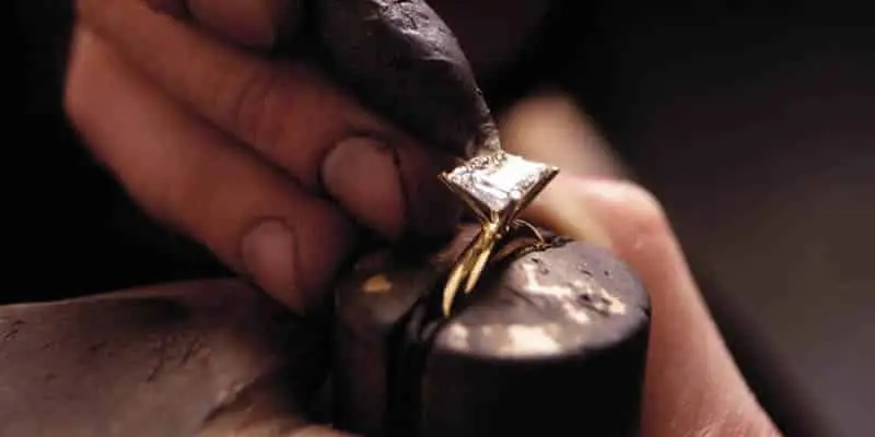 Professional jewellery stone setting workshop with tools and workbench